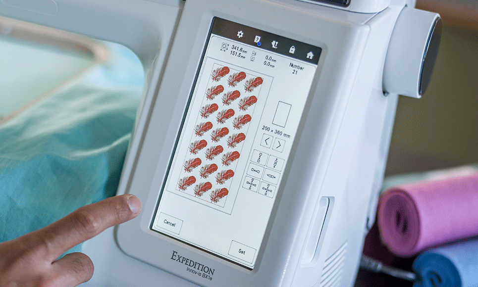 Brother Expedition Innov-is BX1e touchscreen showing repeated embroidery motifs