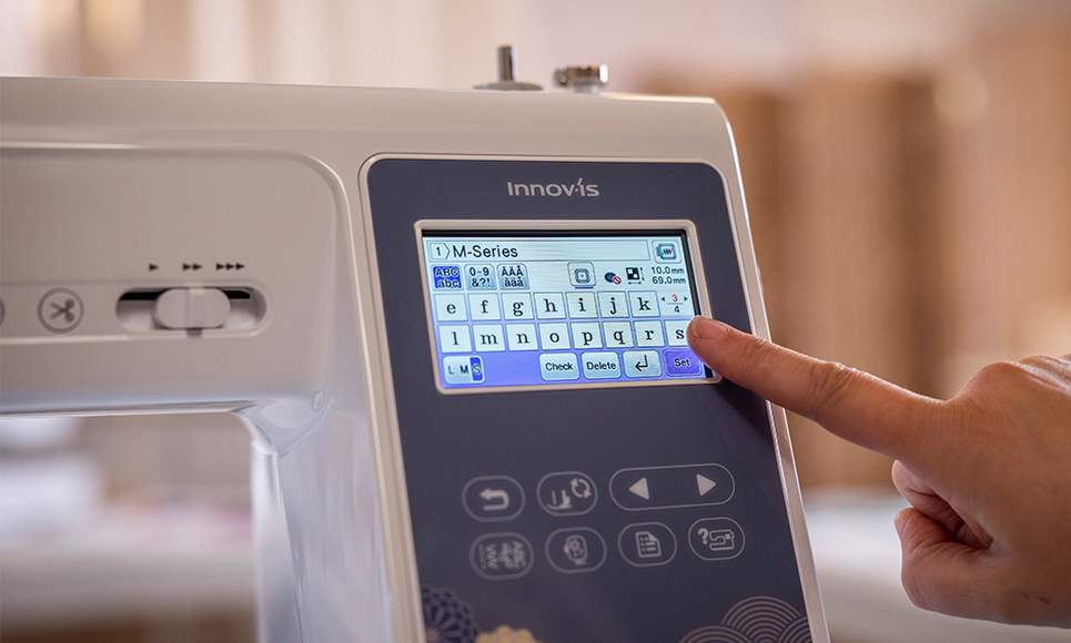 Selecting lettering on the Brother Innov-is M380 colour touchscreen