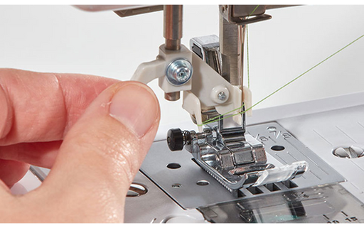 Close-up of needle threader on the Brother SH40 sewing machine