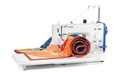 Brother PQ1600S straight stitch machine with wide table and colourful quilt